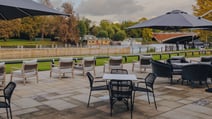 The outdoor terrace at The Runnymede on Thames that overlooks the River Thames