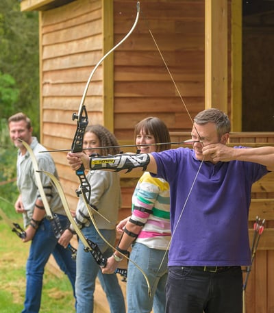 Guests playing archery