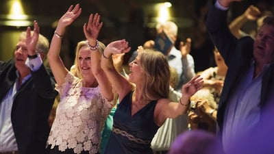 Guests dancing together at a Warner Hotel Christmas Party