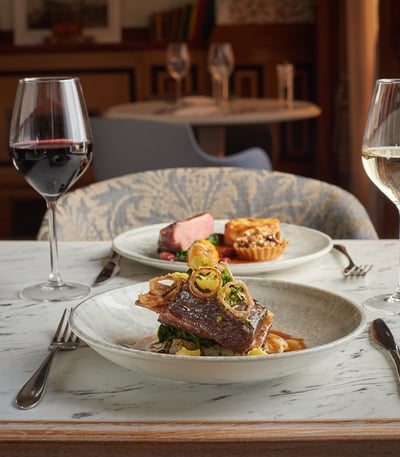 Delicious food served in the Brasserie32 with a glass of red wine to complement