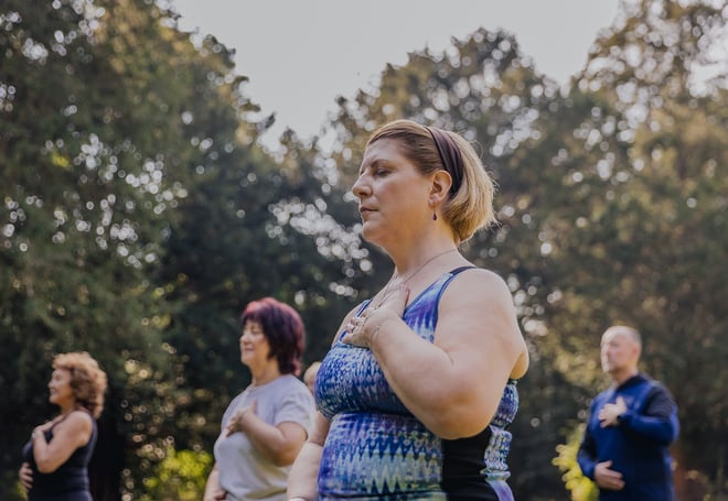 A guest practices breathwork