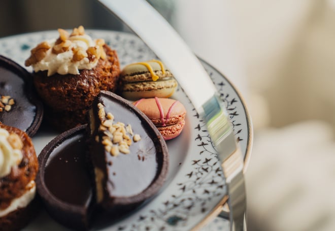 Close up of some cakes on the afternoon tea stand