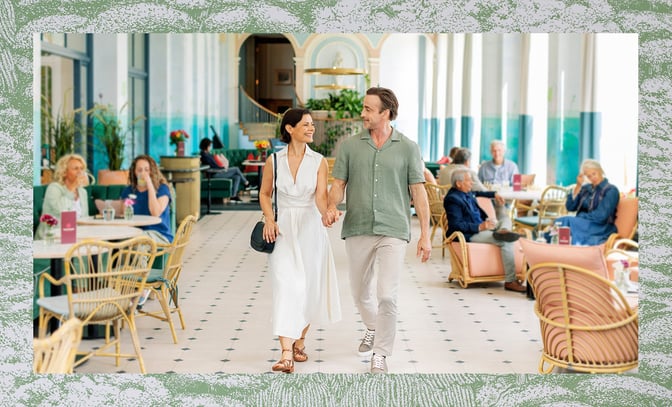 Angie and Mick walk through the Orangery at Heythrop Park, a Warner Hotel