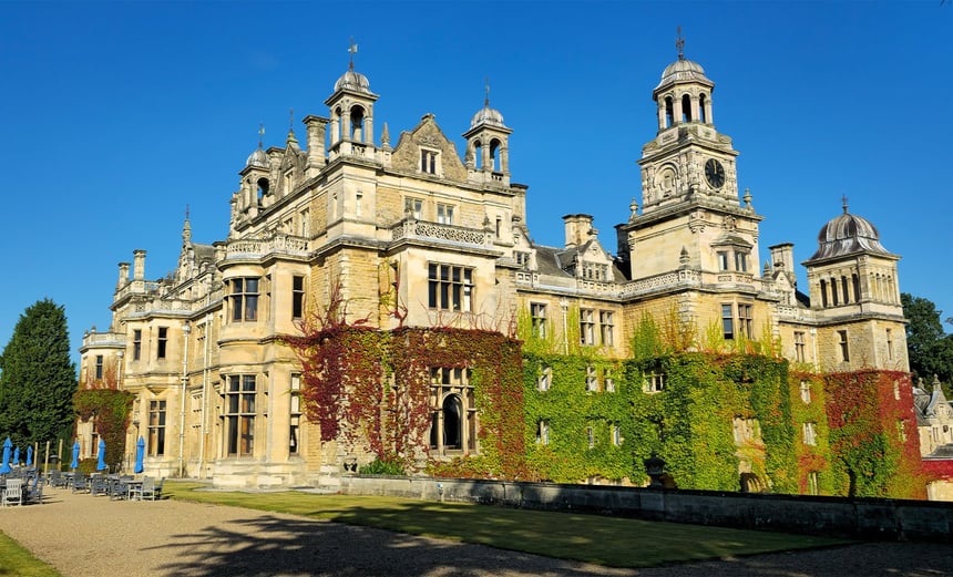 Thoresby Hall featuring numerous windows, showcasing a modern architectural design and ample natural light.