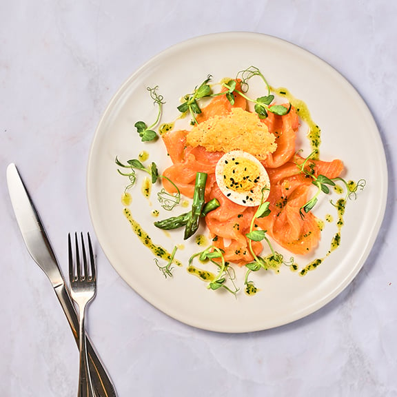 Salmon smoked in Gloucestershire
- Devilled egg, Parmesan crisp, orange dressing