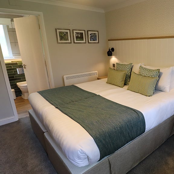 A refurbished bedroom at Gunton Hall